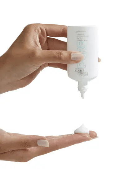 Bondi Sands Pure Self Tanning Drops. Dispensed to show clean texture, clear formula, and smooth application in action.