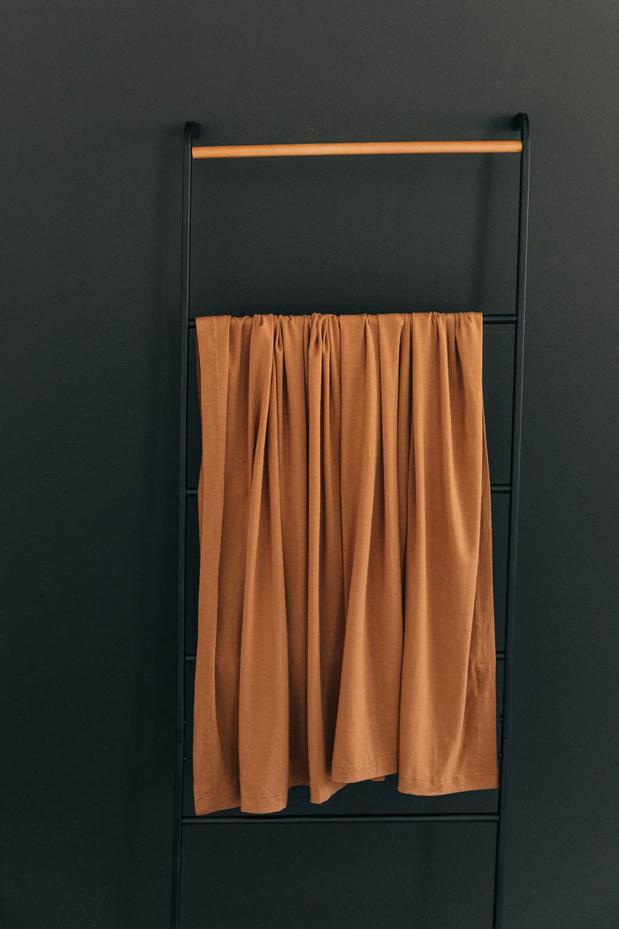 Mebie Baby Bamboo Stretch Swaddle. Gender Neutral for take home outfits and swaddling newborns.