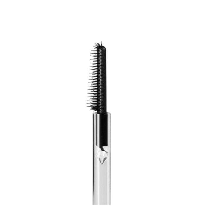 Close-up of a lash and brow serum wand, with a slim, black silicone brush featuring fine, evenly spaced bristles.