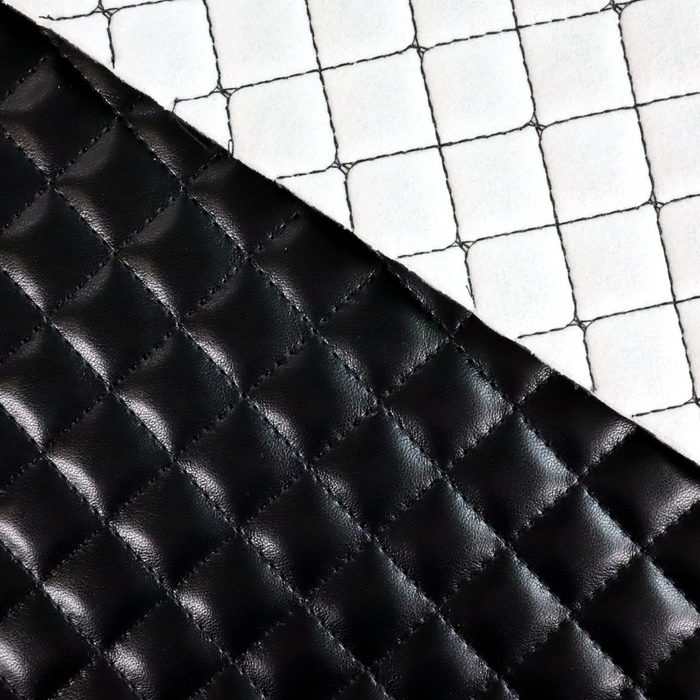 This pre-quilted vinyl is in a solid black.
