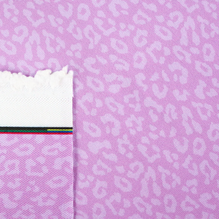 This printed WPC-Lite has a repeating light pink leopard print design with a deep saturated pink background.