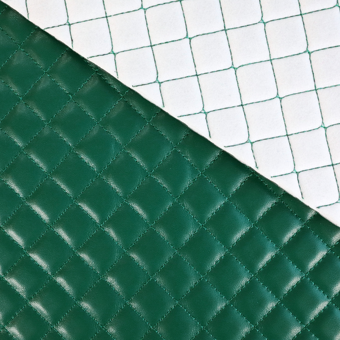This pre-quilted vinyl is a saturated and deep shade of green.