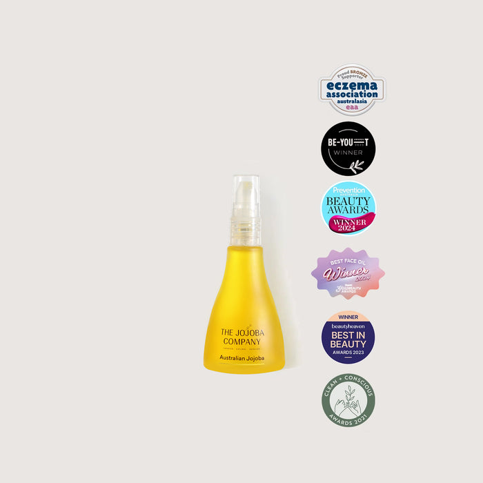 Yellow bottle with a spray nozzle on a white background, surrounded by certification logos.