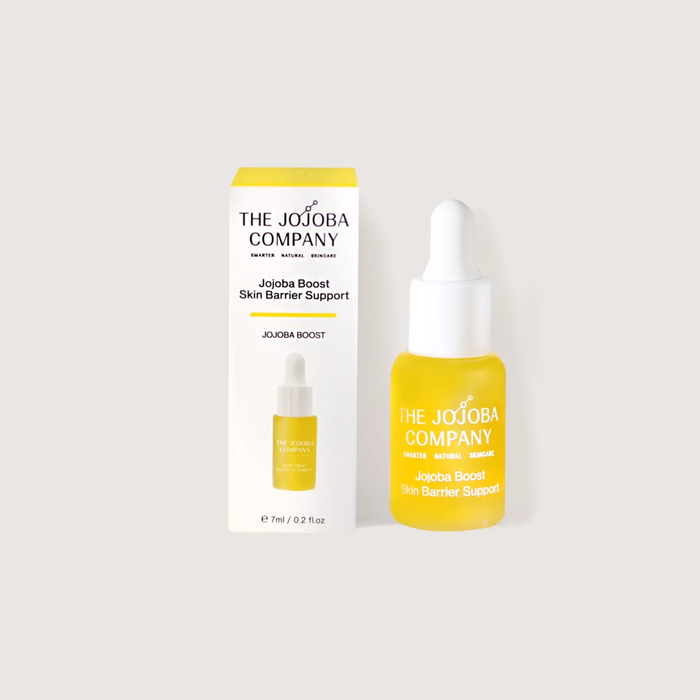 The Jojoba Company skincare product with dropper bottle and packaging on a white background