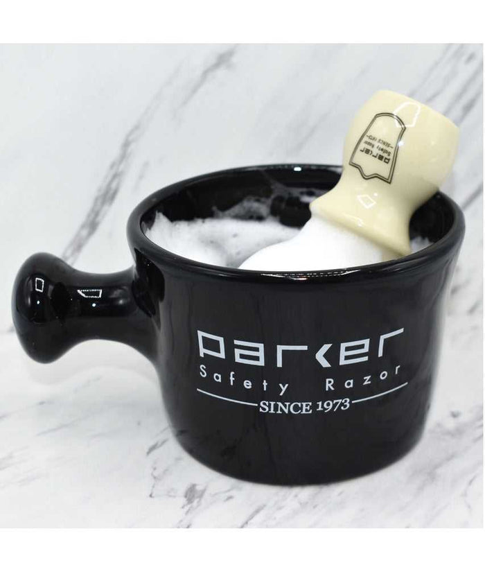 Black Parker safety razor mug with foam and soap
