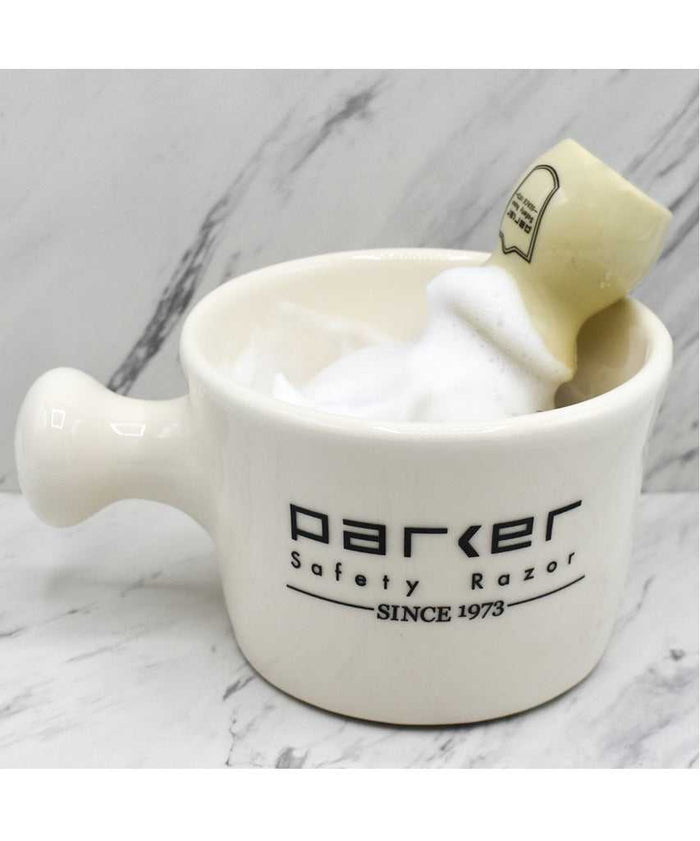 White Parker safety razor mug with logo and soap foam