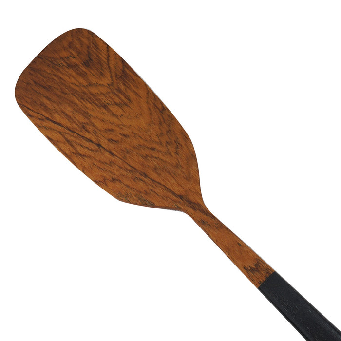 Close up of spatula part of Rico & Plato bistro teak spatula with black handles displayed on a white background