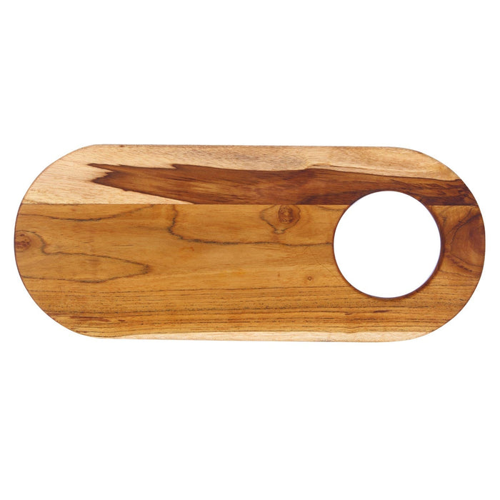 Top view of wooden cutting board with a circular hole on a white background