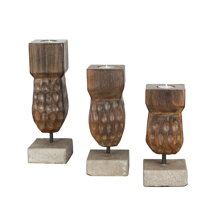 Set of 3 different sized decorative wooden candle holder displayed on a white background