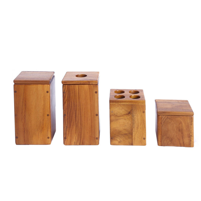 Set of four wooden bathroom containers with different sizes on a white background