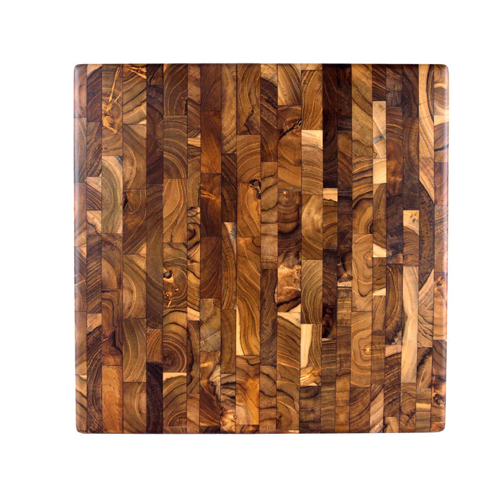 Top view of an end grain cutting board placed on a white background