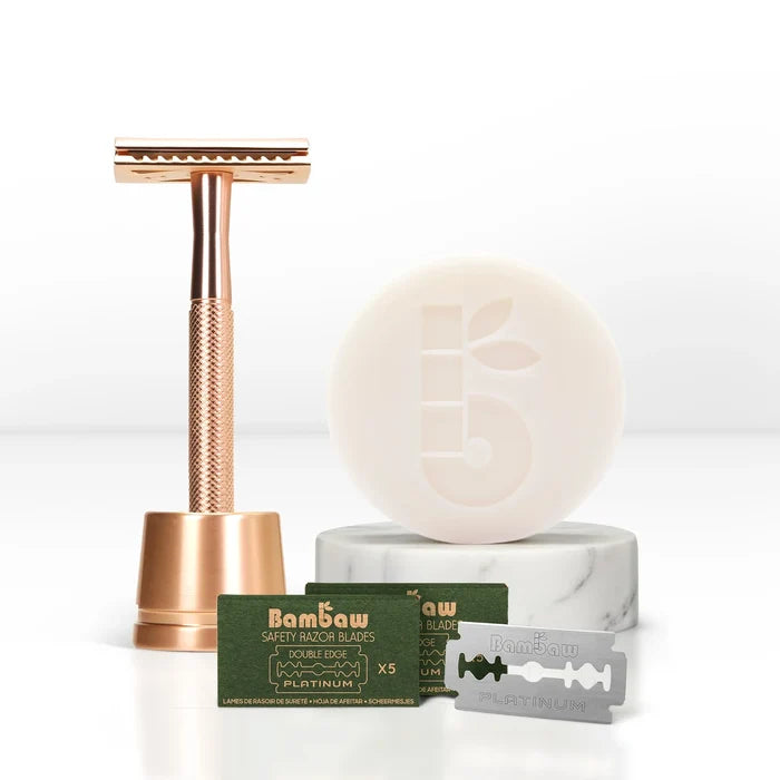 Rosegold Safety razor with BamBaw safety razor blades and soap on a white background