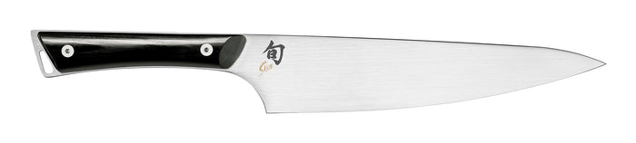 An 8-inch Shun Kazahana Chef's Knife with an ebony handle and a satin finish blade, laying on a white surface.