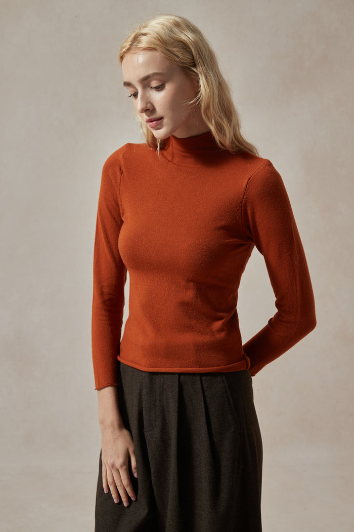 burnt orange turtleneck