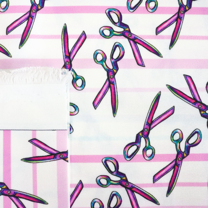 This ReNew Canvas print is of a rainbow scissors design over light blue, pink, and white stripes.