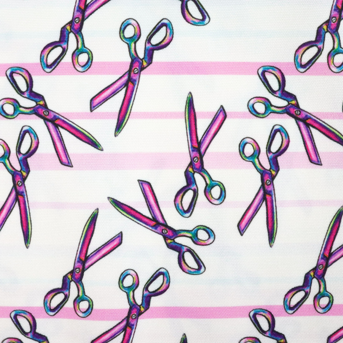 This ReNew Canvas print is of a rainbow scissors design over light blue, pink, and white stripes.