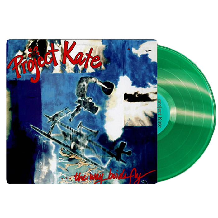 A green vinyl record by Project Kate, partially pulled from its sleeve. The cover shows blue and white clouds, black airplane silhouettes, red "Project Kate" handwriting, and the limited pressing album title "The Way Birds Fly.