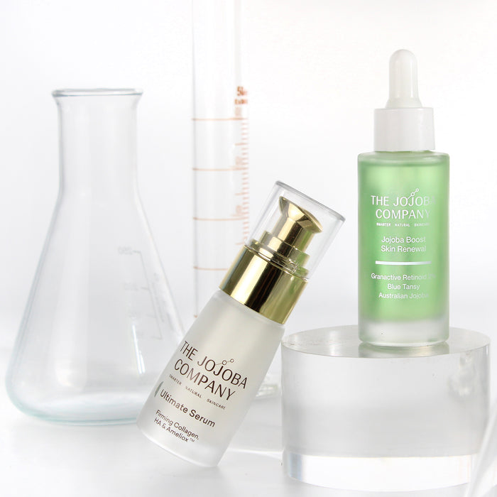 Two skincare products from The Jojoba Company on a white background
