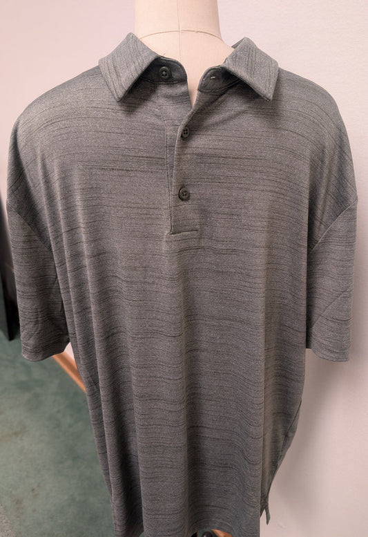 UNDER ARMOUR - DOWNTOWN GREEN POLO *