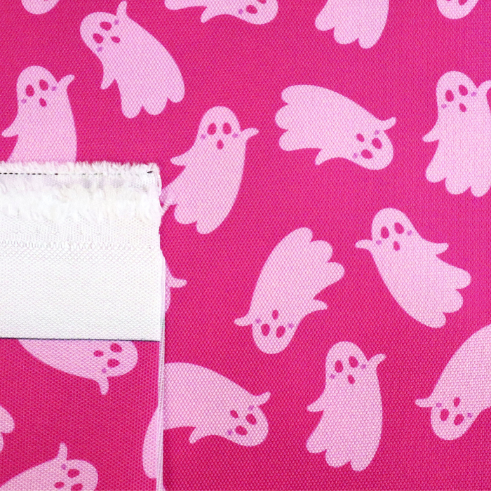 This printed WPC-Lite has ghosts that are featured in light pink on top of a deeper pink background.