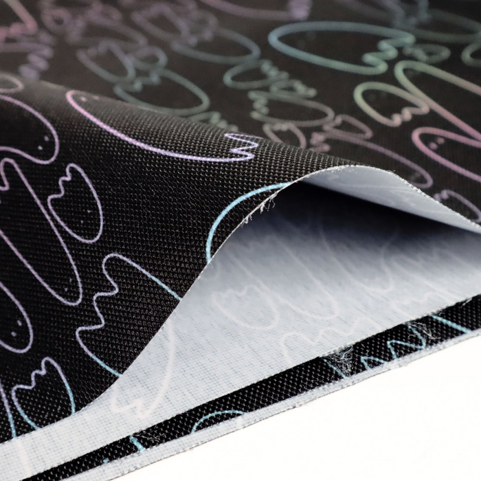 This printed WPC has pastel rainbow ghost outlines in different sizes on a black background.