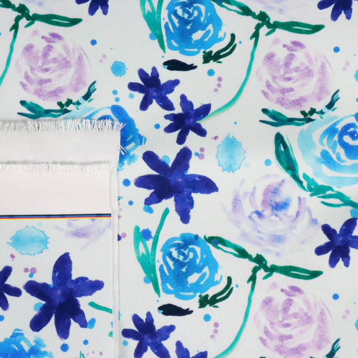This WPCotton has roses and flowers in shades of blue, purple and green.