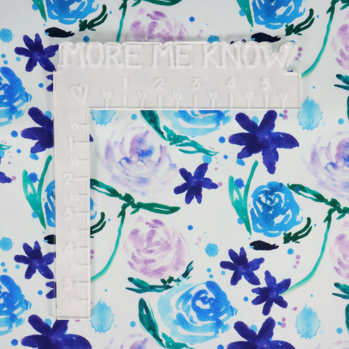 This WPCotton has roses and flowers in shades of blue, purple and green.