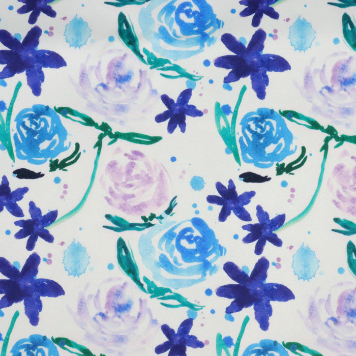 This WPCotton has roses and flowers in shades of blue, purple and green.