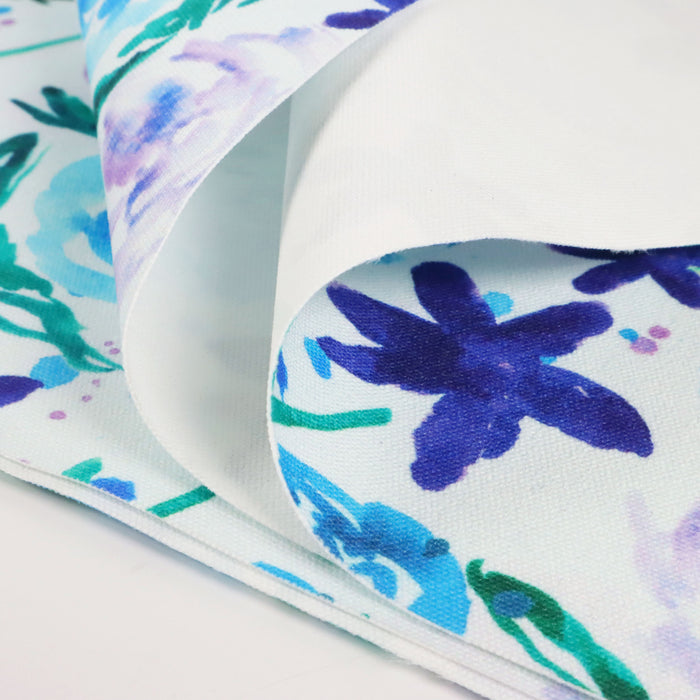 This WPCotton has roses and flowers in shades of blue, purple and green.